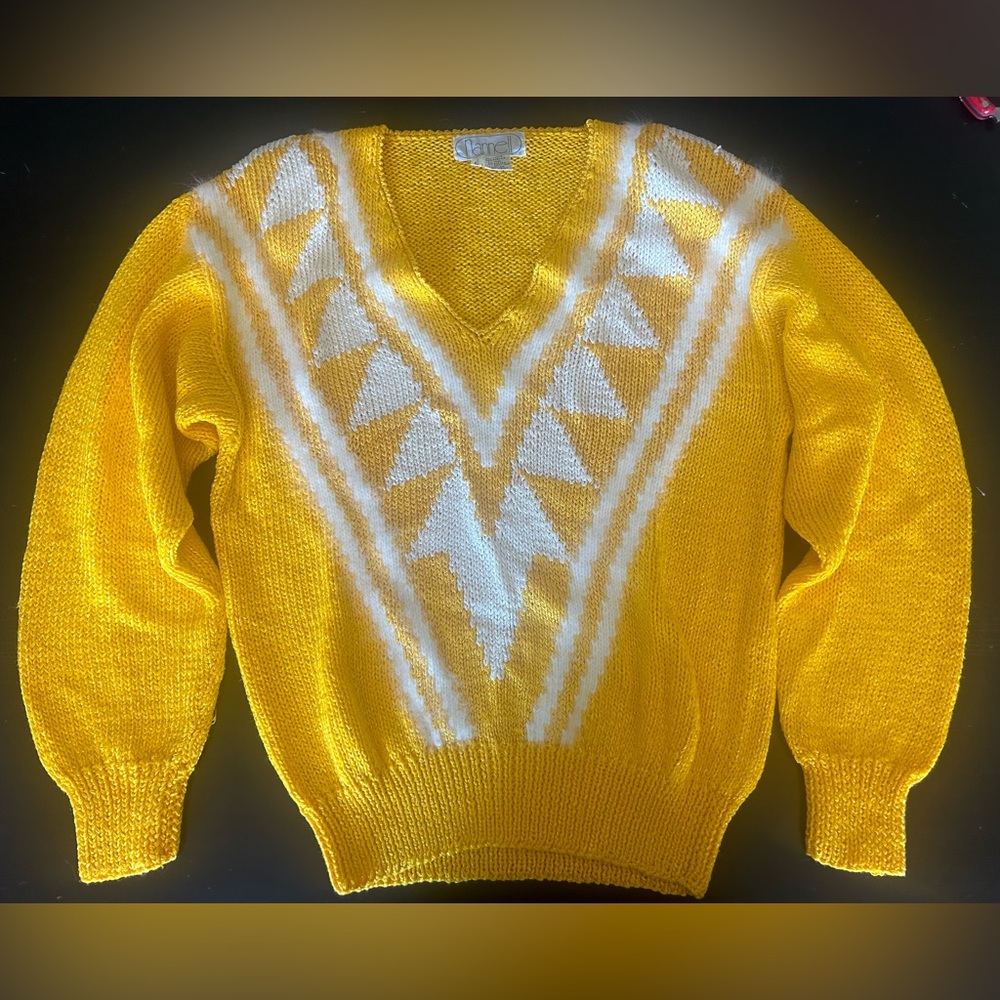 Beautiful 80s vintage hand knit Nannel Sweater. Yellow with white accents.